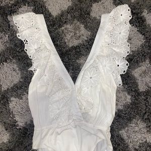 Floral sleeve body suit